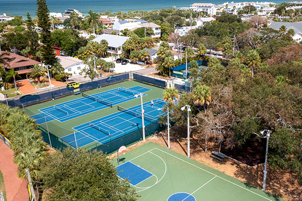 Aerial view of Kolb Park basketball courts and residential areas in Indian Rocks Beach, FL.