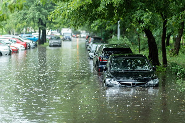 Flooded cars on the street.