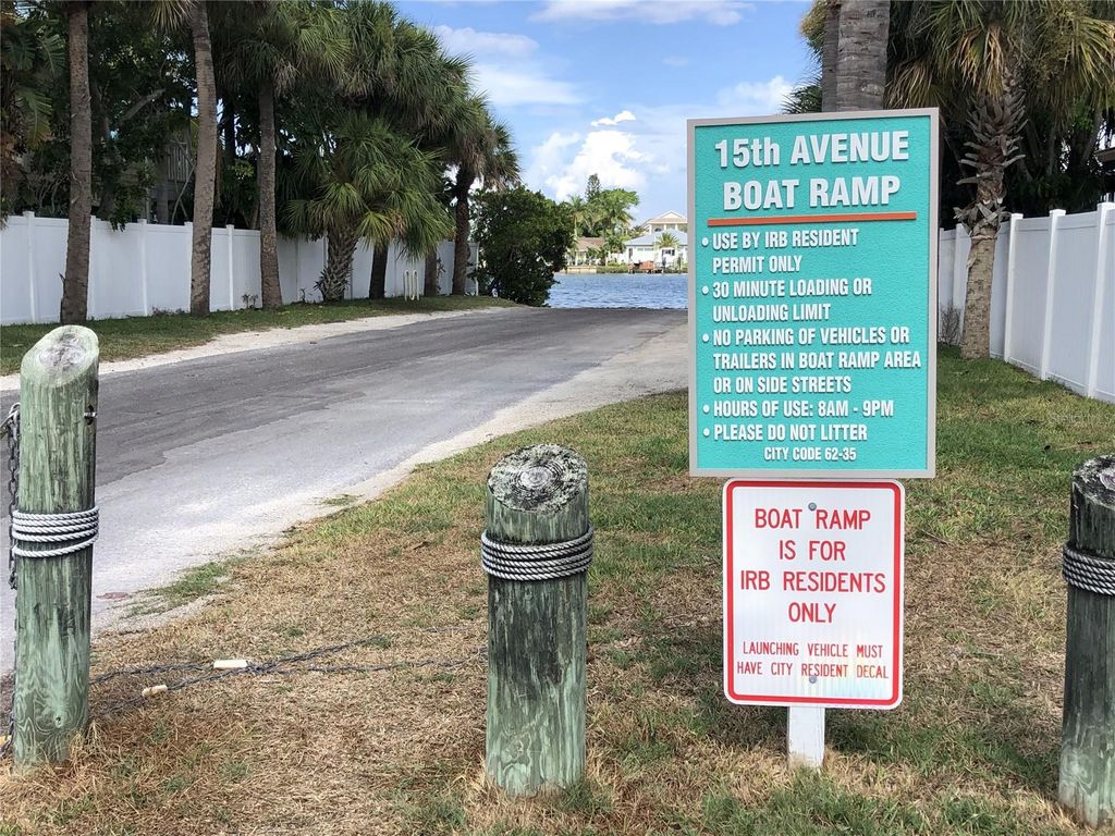 15th avenue Boat ramp sign says use by IRB resident permit only 30 minute loading or unloading limit no parking or vehicles or trailers in boat ramp area or on side streets hours of use are 8am to 9pm please do not liter